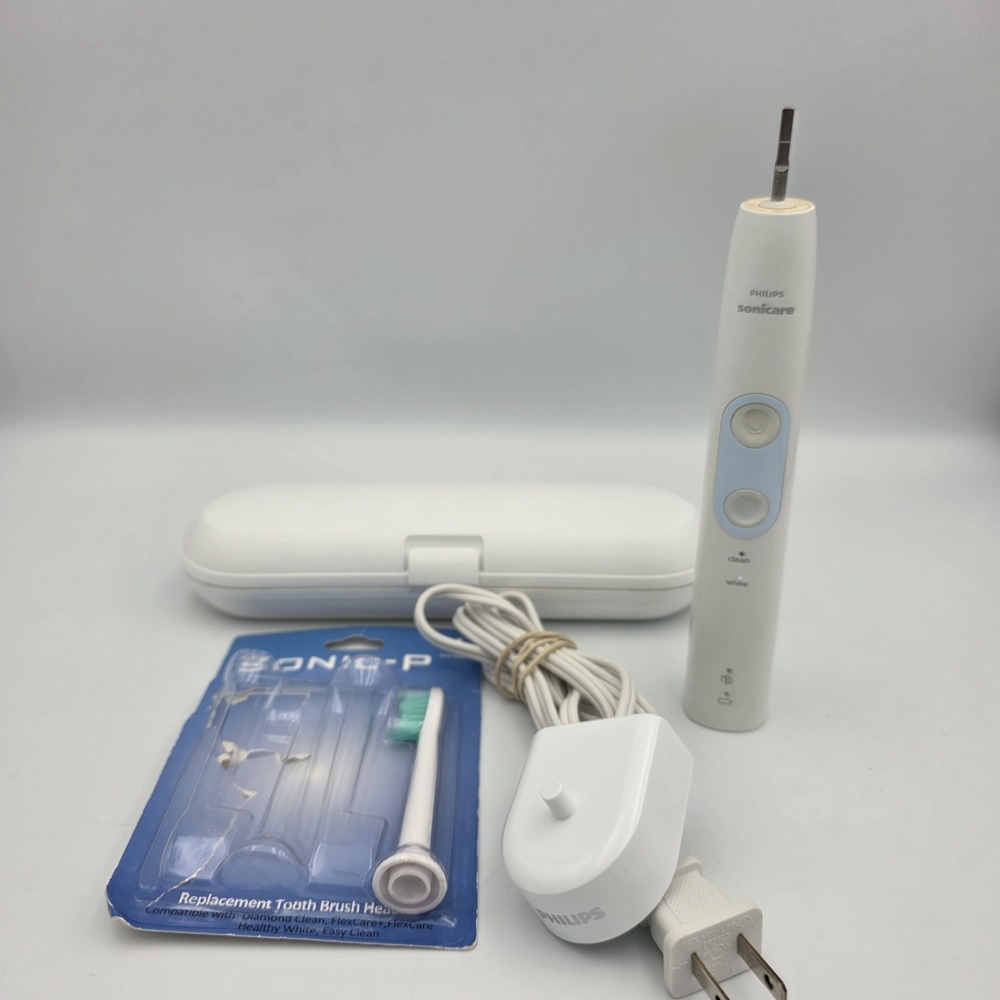 Philips Sonicare Sonic Electric Toothbrush HX686P + Charger + Case + New Head